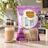 Base Big Train Chai Vainilla Sugar Free Bolsa 1590 Gramos en escena con letrero central Kitchen Experts
