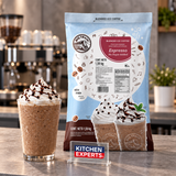 Base Big Train Espresso Sugar Free 1.59 kg con bebida preparada y letrero Kitchen Experts integrado en la escena