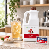 Concentrado Lychee Tea Zone Botella 1.9 Litros con bebida preparada y letrero Kitchen Experts integrado en la escena