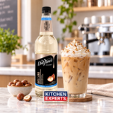 Escena promocional Jarabe DaVinci Avellana Sugar Free 1 Litro con letrero KEX