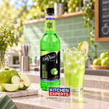 Jarabe Fruit Innnovation DaVinci Manzana Verde Botella 1 Litro en bebida preparada con letrero Kitchen Experts integrado