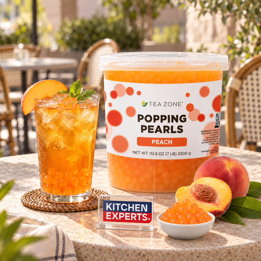 Popping Pearls Durazno Tea Zone 3200g | Perlitas Explosivas en escena con letrero central Kitchen Experts