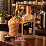 Salsa DaVinci Caramelo Salado Botella 1/2 Galón en escena de cafetería con letrero KEX al centro