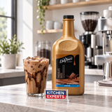 Salsa DaVinci Chocolate Sugar Free Botella 1/2 Galón en escena de cafetería con letrero KEX al centro